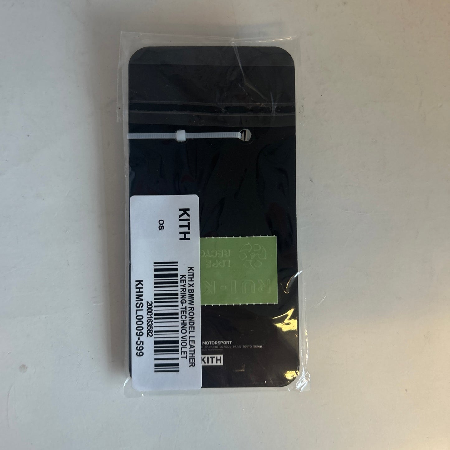 Kith X Me Rondel Leather Keyring In Techno Violet